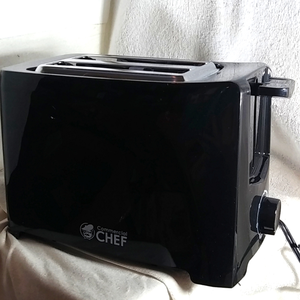 Fab and useful Black toaster. NIB!